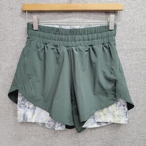 LULULEMON TRACK THAT 2 IN 1 HIGH RISE SHORT, SIZE 6.